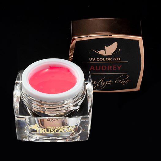 UV gel nail polish in a pink shade with a glossy finish from Truscada Northern Ireland, ideal for professional manicure and pedicure treatments.
